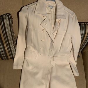 Knee length cream trench coat